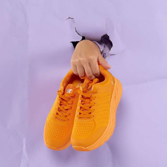 Lifestyle image for Walker Mesh II Active Sneaker - Tangerine
