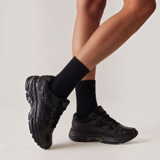 Lifestyle image for X-Trainer Lace-Up Active Sneaker Unisex - Black